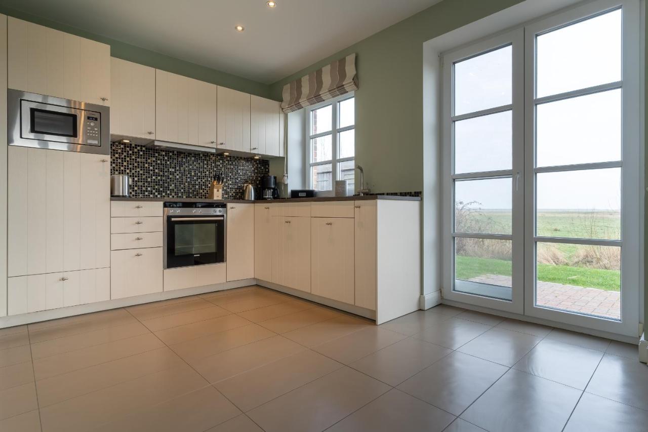 Strandhaus 54 Grad Nord Ferienhaus Strandhaus 54 Grad Nord Brosum Bagian luar foto